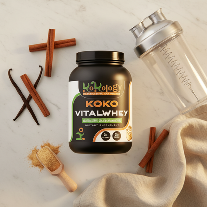 Koko VitalWhey Velvet Reserve Golden Cinnamon Swirl flat lay with cinnamon sticks, vanilla pods and wooden scoop on marble