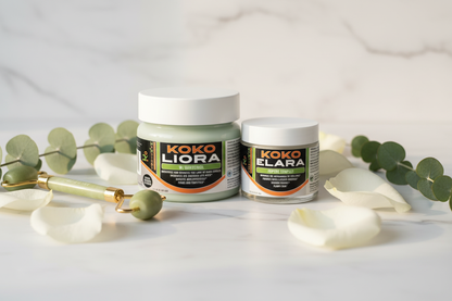 Koko Liora and Koko Elara jars arranged elegantly on marble with rose petals, jade roller and eucalyptus